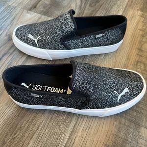 Black and white spotted slipons